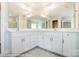 Double vanity bathroom with white cabinets and quartz countertop at 3221 Mcharney Dr # 31, Harrisburg, NC 28075