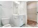 Clean bathroom with white vanity and updated fixtures at 3221 Mcharney Dr # 31, Harrisburg, NC 28075