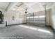 Attached garage with open garage door and concrete flooring at 3221 Mcharney Dr # 31, Harrisburg, NC 28075