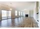 Large living room with hardwood floors, fireplace and sliding glass doors at 3221 Mcharney Dr # 31, Harrisburg, NC 28075