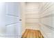 Bright pantry with ample shelving for storage at 3221 Mcharney Dr # 31, Harrisburg, NC 28075