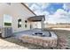 Covered patio with fire pit and brick pavers at 3221 Mcharney Dr # 31, Harrisburg, NC 28075