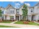 Modern townhome with attractive landscaping at 10511 Boudreaux St, Huntersville, NC 28078