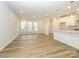 Spacious living room with hardwood floors and lots of natural light at 10511 Boudreaux St, Huntersville, NC 28078