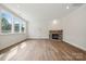 Living room with hardwood floors and stone fireplace at 3219 Timber Run Ln, Maiden, NC 28650