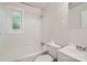 Cozy bathroom with a shower-tub combo, toilet, and sink at 3245 Minnesota Rd, Charlotte, NC 28208