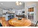 Bright dining area with outdoor access, features view into the living room and kitchen at 7876 Rebecca Rd, Denver, NC 28037