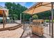 Outdoor grilling area with built-in grill and gazebo, perfect for entertaining at 7876 Rebecca Rd, Denver, NC 28037