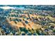 Scenic aerial view of homes nestled among lush trees and a beautiful lake at 332 Canvasback Rd, Mooresville, NC 28117