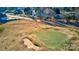 Aerial view showcasing a golf course community with houses and mature trees at 332 Canvasback Rd, Mooresville, NC 28117