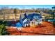 Aerial view of the back of the house, showing a large deck and backyard at 332 Canvasback Rd, Mooresville, NC 28117