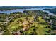 Aerial view of lakefront property with golf course at 332 Canvasback Rd, Mooresville, NC 28117