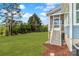 Expansive backyard with lush lawn and a screened porch, perfect for outdoor enjoyment and relaxation at 332 Canvasback Rd, Mooresville, NC 28117