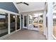 Stylish screened porch with sliding glass doors, perfect for indoor-outdoor living at 332 Canvasback Rd, Mooresville, NC 28117