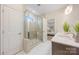 This bathroom features a glass enclosed shower and under cabinet storage at 225 English Arbor Dr # 13, Fort Mill, SC 29715