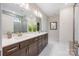 This bathroom includes dual vanities with under cabinet storage and a large mirror at 225 English Arbor Dr # 13, Fort Mill, SC 29715