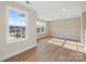 This is a bright bonus room with natural light and hardwood flooring at 225 English Arbor Dr # 13, Fort Mill, SC 29715