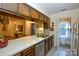 View of the kitchen with ample counter space and view to the laundry room at 102 Cedar Hollow St, Fort Mill, SC 29715