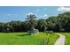 Aerial view of a detached workshop, trees, and a curved driveway at 120 Zorse Ln, Statesville, NC 28625