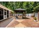 Large patio with pergola, grill and seating area at 120 Zorse Ln, Statesville, NC 28625