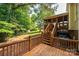 Wooden deck overlooks a private backyard with trees at 2594 Knoll Ridge Ct, Hickory, NC 28602