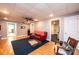 Finished basement recreation area with comfy seating at 2594 Knoll Ridge Ct, Hickory, NC 28602