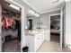 Main bathroom with double vanity, walk-in closet, and bedroom access at 2594 Knoll Ridge Ct, Hickory, NC 28602