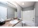 Clean bathroom with a shower/tub combo and updated vanity at 2594 Knoll Ridge Ct, Hickory, NC 28602