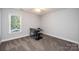 Bright bedroom featuring a desk and chair, perfect for a home office at 2594 Knoll Ridge Ct, Hickory, NC 28602