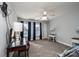 Spacious bedroom with a vanity, large windows, and ceiling fan at 2594 Knoll Ridge Ct, Hickory, NC 28602