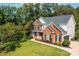 Two-story brick home with a gray roof and attached garage at 2594 Knoll Ridge Ct, Hickory, NC 28602