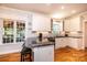 Modern kitchen with white cabinets, granite countertops, and stainless steel appliances at 2594 Knoll Ridge Ct, Hickory, NC 28602