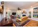 Spacious living room with hardwood floors, fireplace and access to backyard at 2594 Knoll Ridge Ct, Hickory, NC 28602