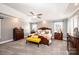 Bright main bedroom with carpeted floors and ceiling fan at 2594 Knoll Ridge Ct, Hickory, NC 28602