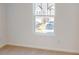 Bright bedroom with neutral carpeting and a large window at 3578 Nimbell Rd, Monroe, NC 28110