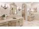 Elegant bathroom with custom vanities, ornate mirrors, and sophisticated lighting at 423 Oakmont Ln, Waxhaw, NC 28173