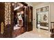 Grand entryway showcases intricate woodwork, custom doors, and access to the library at 423 Oakmont Ln, Waxhaw, NC 28173