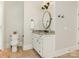 Elegant bathroom with vanity, toilet, and designer mirror at 1218 Wareham Ct, Charlotte, NC 28207