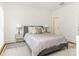 Well-lit bedroom with a double bed and built-in shelving at 1218 Wareham Ct, Charlotte, NC 28207