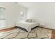 Cozy bedroom with hardwood floors, a queen-size bed, and a neutral color scheme at 1218 Wareham Ct, Charlotte, NC 28207