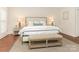Serene bedroom with neutral tones and a comfortable bed at 1218 Wareham Ct, Charlotte, NC 28207
