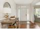 Bright entryway with hardwood floors and console table at 1218 Wareham Ct, Charlotte, NC 28207