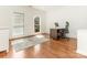 Bright home office features hardwood floors, window seating, and built-in shelving at 1218 Wareham Ct, Charlotte, NC 28207