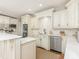 Spacious kitchen with white cabinets and marble countertops at 1218 Wareham Ct, Charlotte, NC 28207