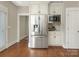 Stainless steel appliances and white cabinetry at 1218 Wareham Ct, Charlotte, NC 28207