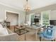 Home office with built-in workspace and comfy seating at 1218 Wareham Ct, Charlotte, NC 28207