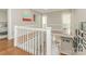 Upstairs hallway offers views to the entryway and bedrooms at 1218 Wareham Ct, Charlotte, NC 28207