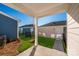 Private backyard with a patio and attached garage at 10509 Boudreaux St, Huntersville, NC 28078