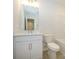 Simple bathroom with white vanity, toilet and bathtub at 10509 Boudreaux St, Huntersville, NC 28078