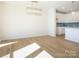 Spacious dining area with hardwood floors and kitchen views at 10509 Boudreaux St, Huntersville, NC 28078